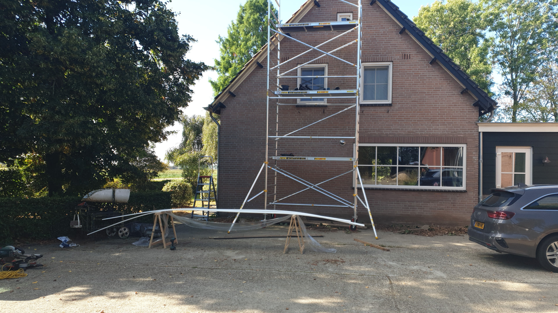 Buitenschilderwerk op hoogte foto 2
