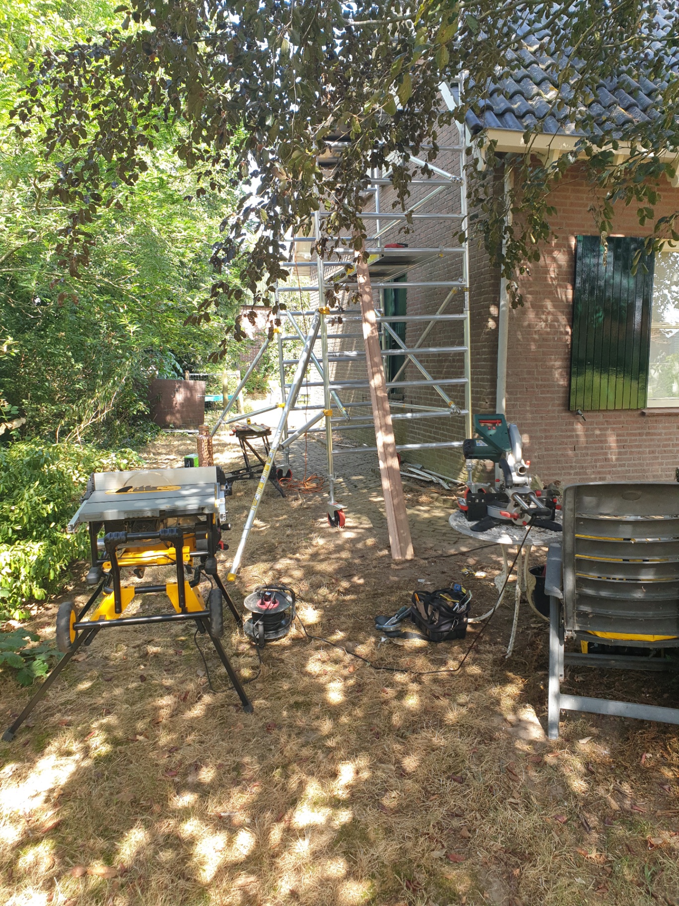 Buitenschilderwerk op hoogte foto 1